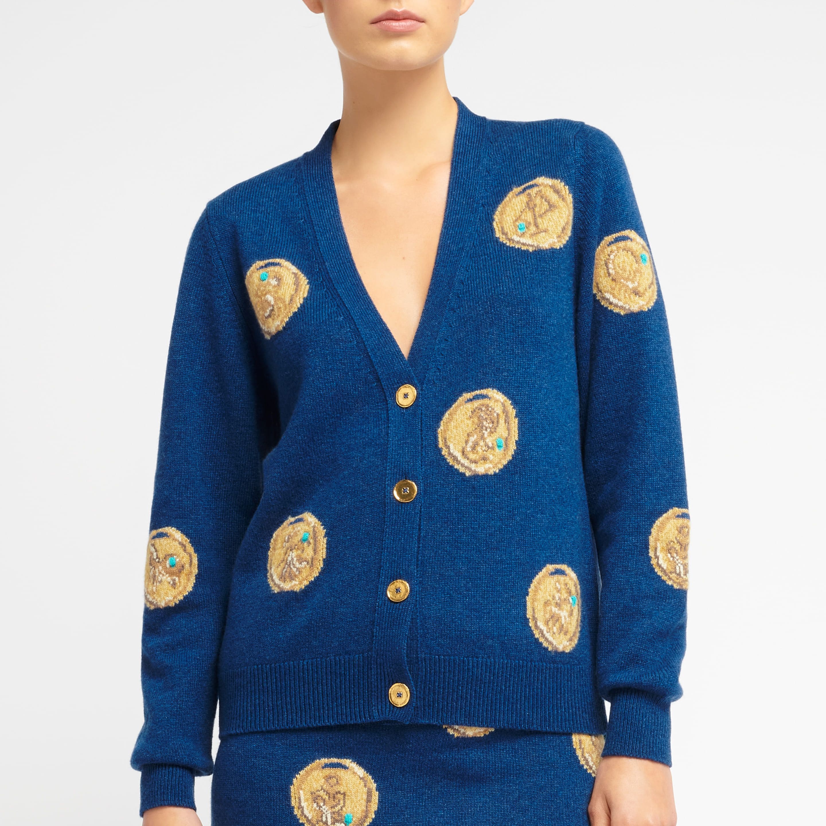 Cardigan in cashmere with a zodiac motif
